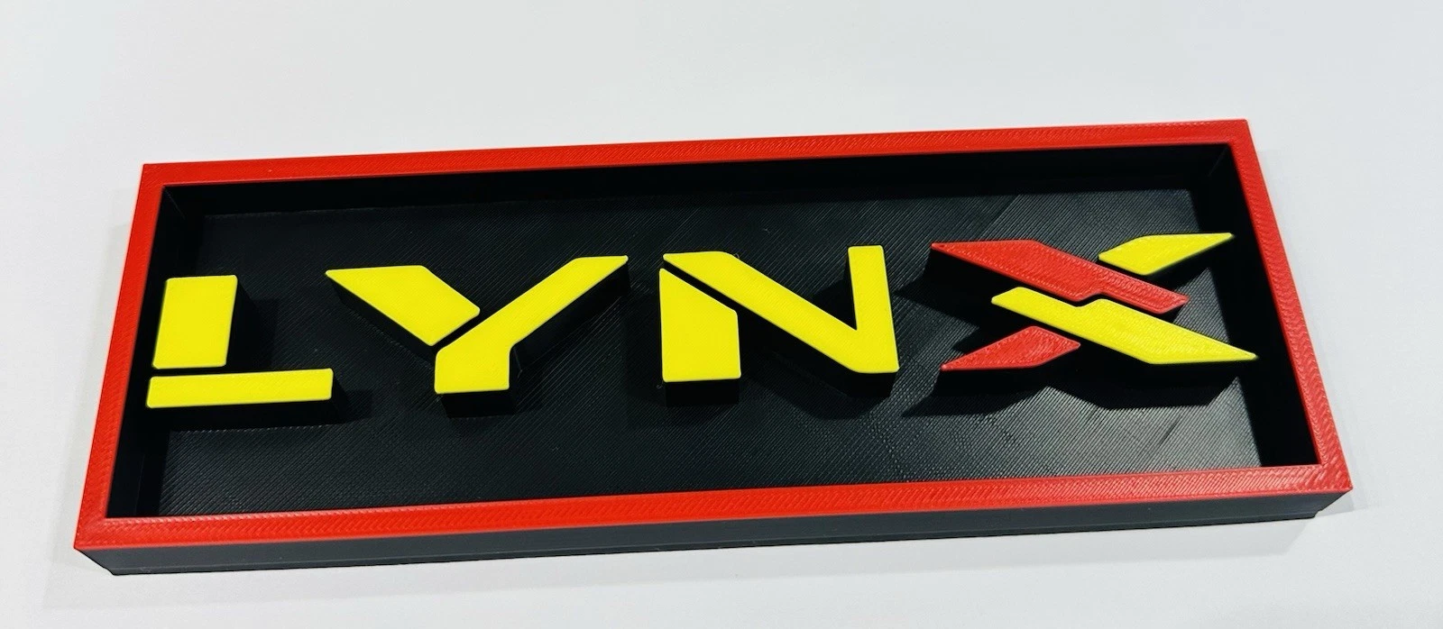 Decorative Lynx logo Sign Display Cinema small 17.5cm Large 22cm